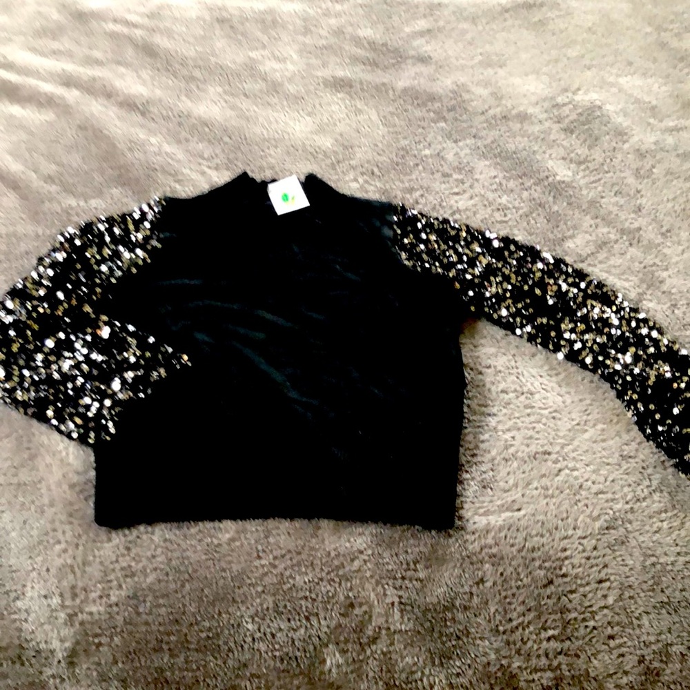Mock neck sweater with sequin sleeves!